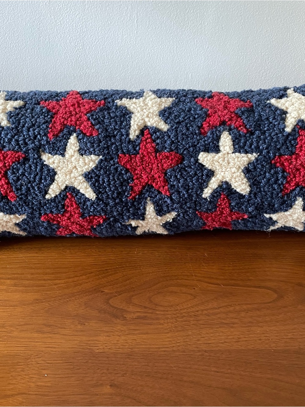 Stars on blue background stitches accent pillow